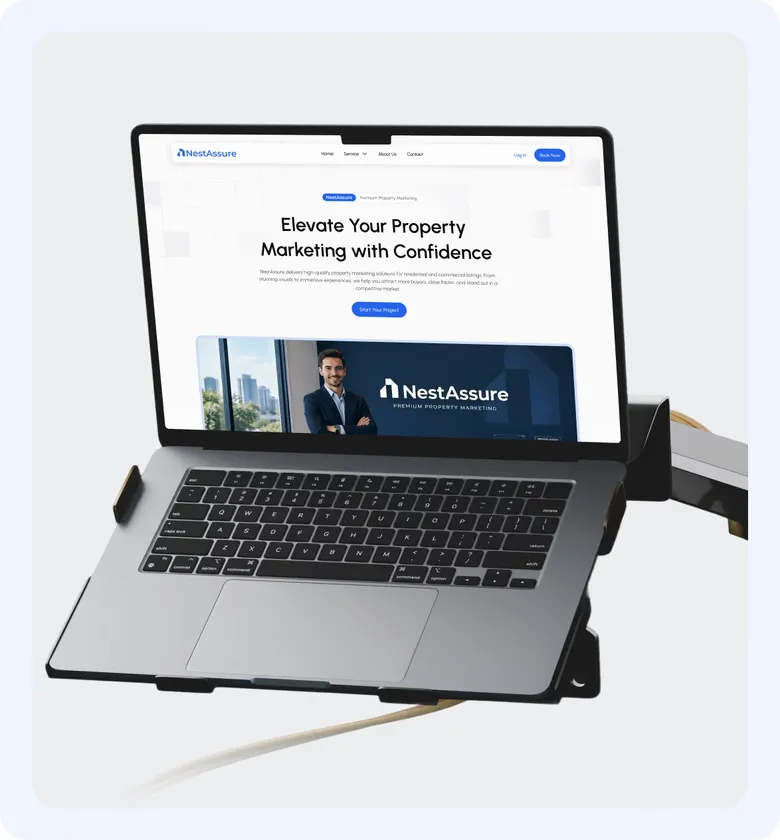 NestAssure homepage on an open laptop on a desk stand.